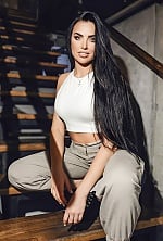 Ukrainian mail order bride Nadezhda from Kyiv with black hair and green eye color - image 4