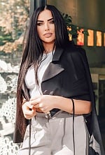 Ukrainian mail order bride Nadezhda from Kyiv with black hair and green eye color - image 2