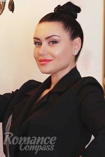 Ukrainian mail order bride Catherine from Kyiv with light brown hair and blue eye color - image 1