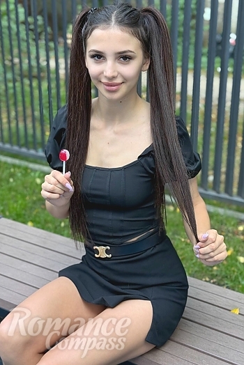 Ukrainian mail order bride Ekaterina from Ivano-Frankivsk with light brown hair and brown eye color - image 1