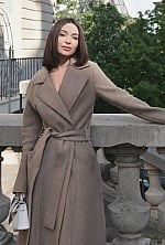 Ukrainian mail order bride Anastasia from Kyiv with black hair and green eye color - image 3