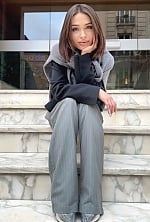 Ukrainian mail order bride Anastasia from Kyiv with black hair and green eye color - image 2