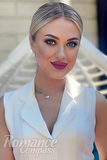 Ukrainian mail order bride Olha from Kyiv with blonde hair and green eye color - image 1