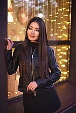Ukrainian mail order bride Ainura from Astana with brunette hair and hazel eye color - image 5