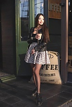 Ukrainian mail order bride Ainura from Astana with brunette hair and hazel eye color - image 9
