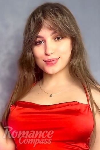 Ukrainian mail order bride Kristina from Prague with light brown hair and brown eye color - image 1