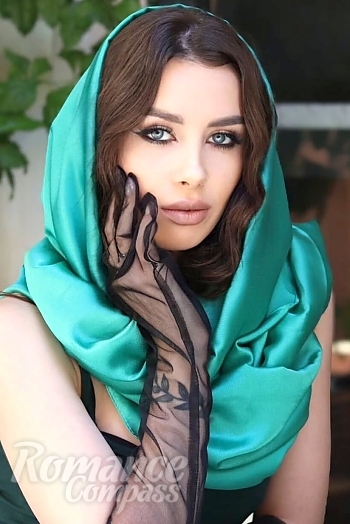 Ukrainian mail order bride Nicoleta from Floreşti with brunette hair and blue eye color - image 1