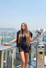 Ukrainian mail order bride Anastasia from Kyiv with light brown hair and blue eye color - image 5