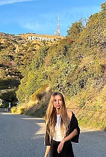 Ukrainian mail order bride Anastasia from Kyiv with light brown hair and blue eye color - image 4