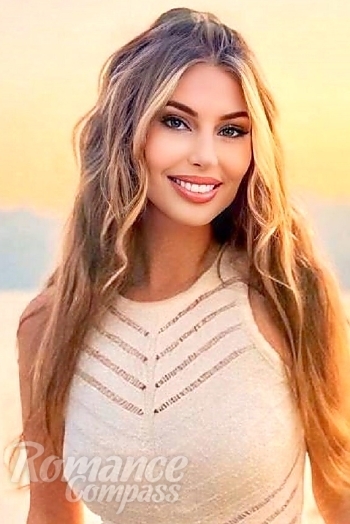 Ukrainian mail order bride Yana from Toronto with light brown hair and blue eye color - image 1