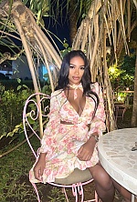 Ukrainian mail order bride Rizqa from Bali with auburn hair and brown eye color - image 2