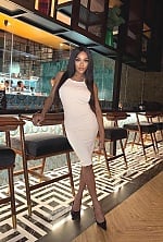 Ukrainian mail order bride Rizqa from Bali with auburn hair and brown eye color - image 8