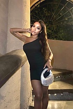 Ukrainian mail order bride Rizqa from Bali with auburn hair and brown eye color - image 6