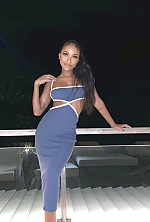 Ukrainian mail order bride Rizqa from Bali with auburn hair and brown eye color - image 9