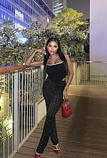 Ukrainian mail order bride Rizqa from Bali with auburn hair and brown eye color - image 5