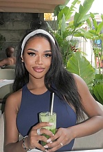 Ukrainian mail order bride Rizqa from Bali with auburn hair and brown eye color - image 4