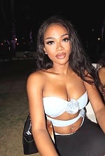 Ukrainian mail order bride Rizqa from Bali with auburn hair and brown eye color - image 3