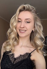 Ukrainian mail order bride Anastasiia from Ivano-Frankivsk with blonde hair and green eye color - image 11