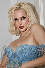 Ukrainian mail order bride Yuliia from London with blonde hair and green eye color - image 12