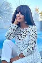 Ukrainian mail order bride Olha from Kyiv with black hair and brown eye color - image 7