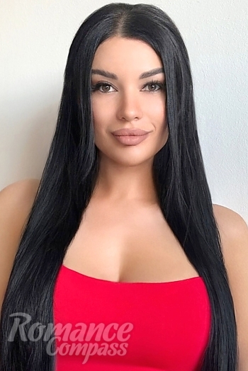 Ukrainian mail order bride Alina from Kyiv with black hair and hazel eye color - image 1