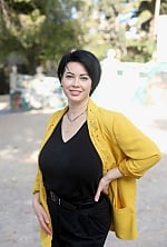 Ukrainian mail order bride Olga from Alicante with black hair and green eye color - image 2