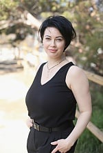Ukrainian mail order bride Olga from Alicante with black hair and green eye color - image 5