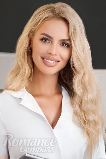 Ukrainian mail order bride Natalia from Kyiv with blonde hair and green eye color - image 1