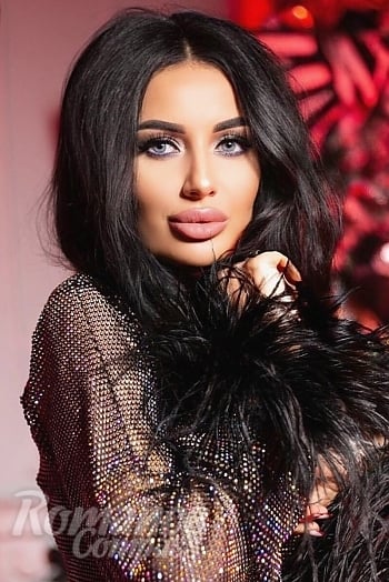 Ukrainian mail order bride Yuliia from Montreal with black hair and blue eye color - image 1