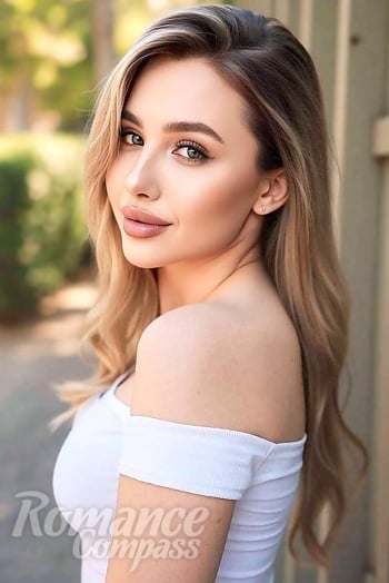 Ukrainian mail order bride Anna from Kyiv with blonde hair and green eye color - image 1