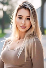 Ukrainian mail order bride Anna from Kyiv with blonde hair and green eye color - image 5