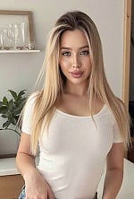 Ukrainian mail order bride Anna from Kyiv with blonde hair and green eye color - image 13
