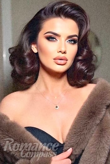 Ukrainian mail order bride Milena from Kaunas with black hair and green eye color - image 1