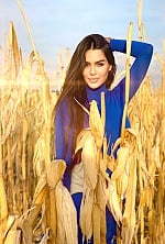 Ukrainian mail order bride Yuliia from Kyiv with brunette hair and brown eye color - image 5
