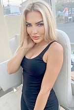 Ukrainian mail order bride Natalia from Kyiv with blonde hair and green eye color - image 9