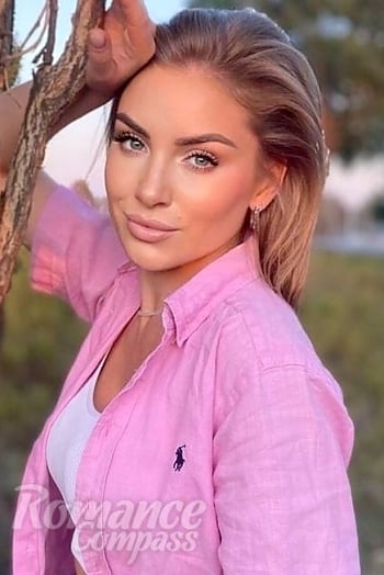 Ukrainian mail order bride Irina from Lutsk with light brown hair and blue eye color - image 1