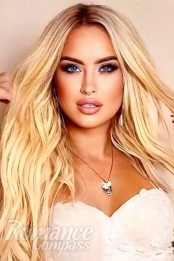 Ukrainian mail order bride Olena from Kyiv with blonde hair and blue eye color - image 1