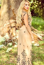 Ukrainian mail order bride Olena from Kyiv with blonde hair and blue eye color - image 4