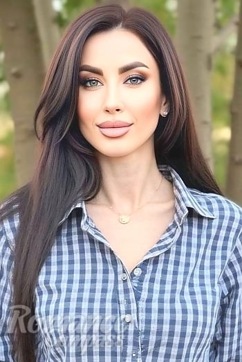 Ukrainian mail order bride Olga from Odesa with brunette hair and green eye color - image 1