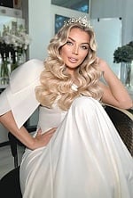 Ukrainian mail order bride Yuliia from Kyiv with blonde hair and blue eye color - image 6
