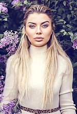 Ukrainian mail order bride Yuliia from Kyiv with blonde hair and blue eye color - image 2