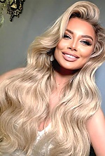 Ukrainian mail order bride Yuliia from Kyiv with blonde hair and blue eye color - image 7