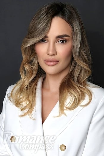 Ukrainian mail order bride Nadezhda from Kyiv with blonde hair and brown eye color - image 1