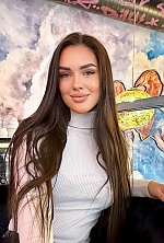 Ukrainian mail order bride Anastasia from Kharkiv with light brown hair and green eye color - image 9