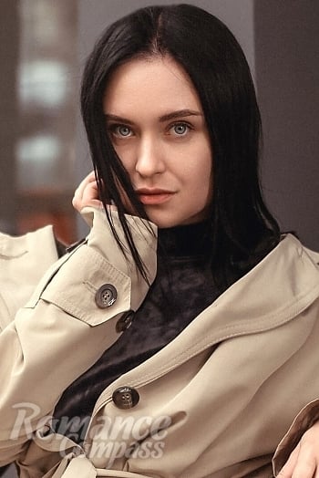 Ukrainian mail order bride Yuliia from Kyiv with black hair and blue eye color - image 1