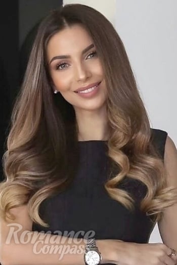 Ukrainian mail order bride Alina from Kyiv with light brown hair and blue eye color - image 1