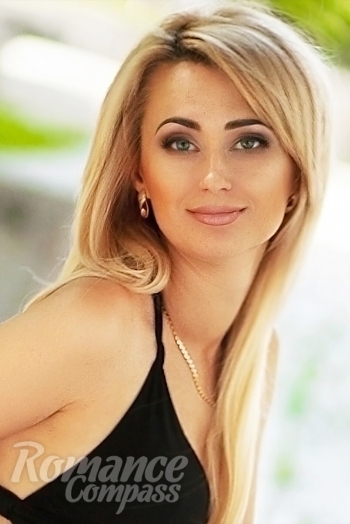 Ukrainian mail order bride Nataliya from Amsterdam with blonde hair and grey eye color - image 1