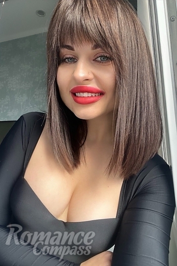 Ukrainian mail order bride Kateryna from Kyiv with light brown hair and green eye color - image 1