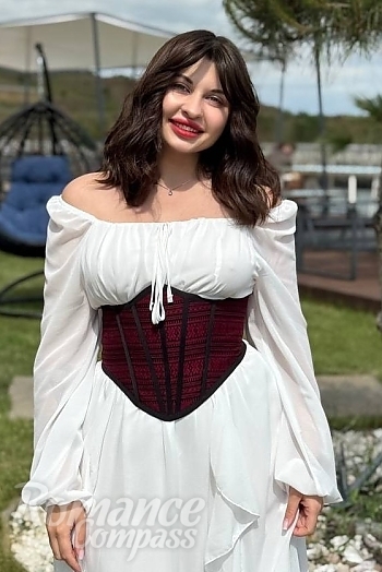 Ukrainian mail order bride Kateryna from Kyiv with light brown hair and green eye color - image 1