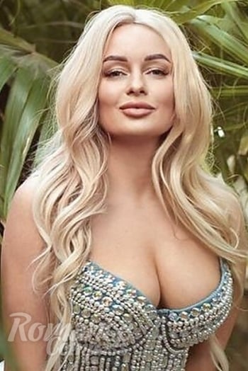 Ukrainian mail order bride Olga from Warsaw with blonde hair and green eye color - image 1